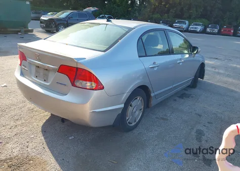 2010 Honda Civic Hybrid z USA, uszkodzony, nr VIN JHMFA3F28AS004965